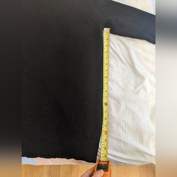 Black Off-the-Shoulder Sweater with Unique Cut-Out Neckline and Fitted Sleeves - Picture 5 of 9